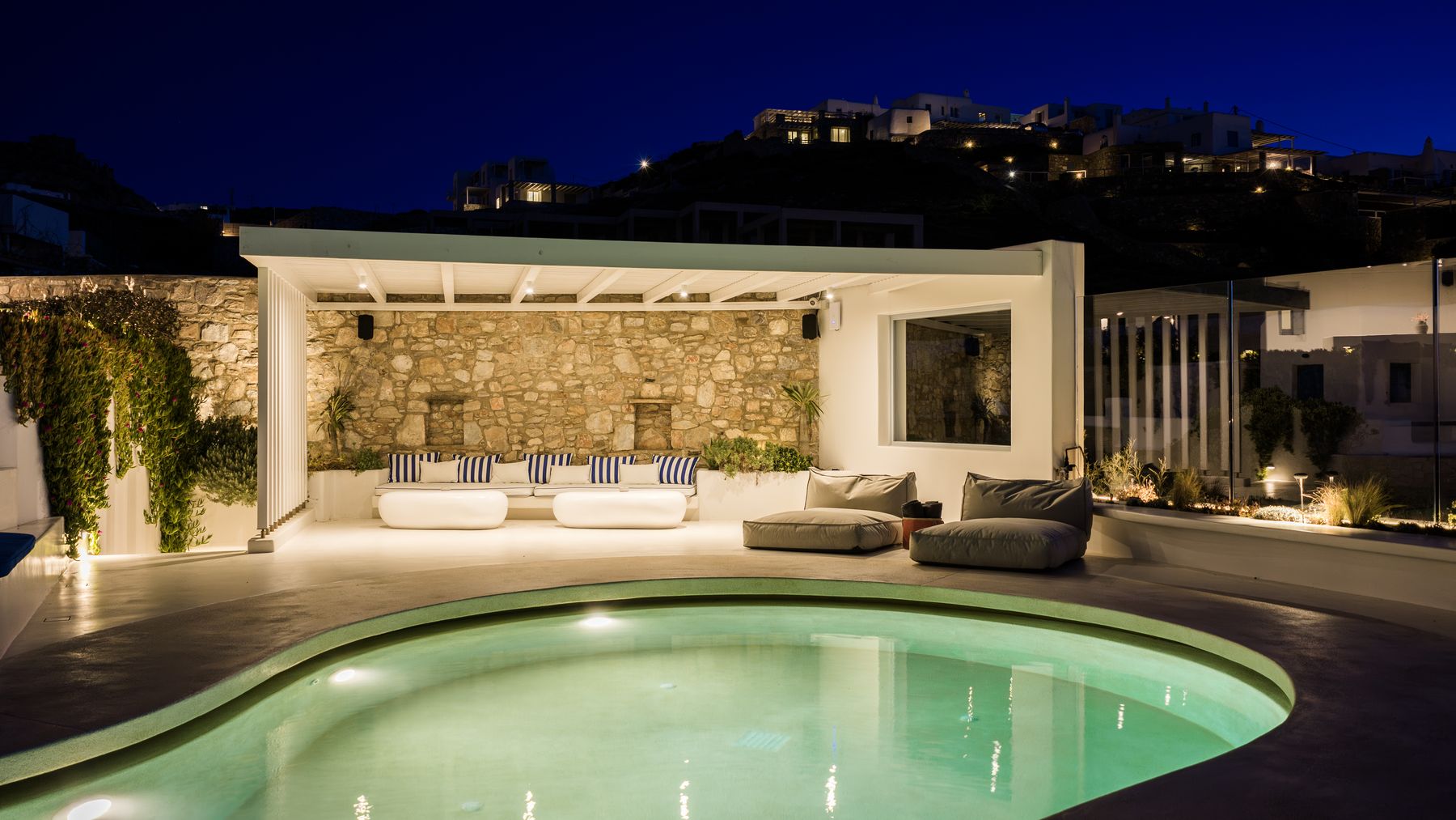 The pool and lounge pergola at night