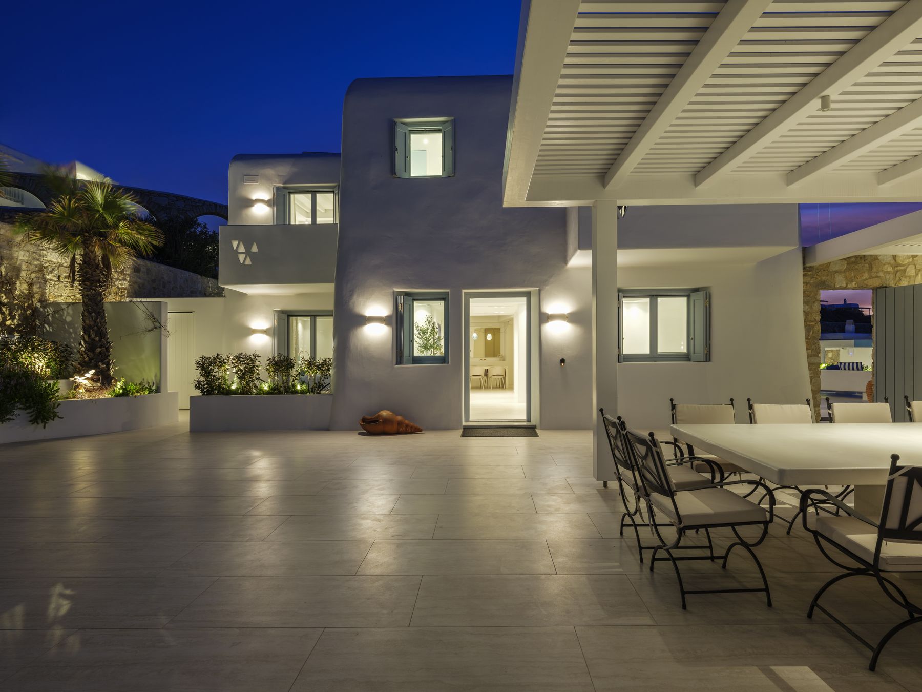 Pergola dining area at night