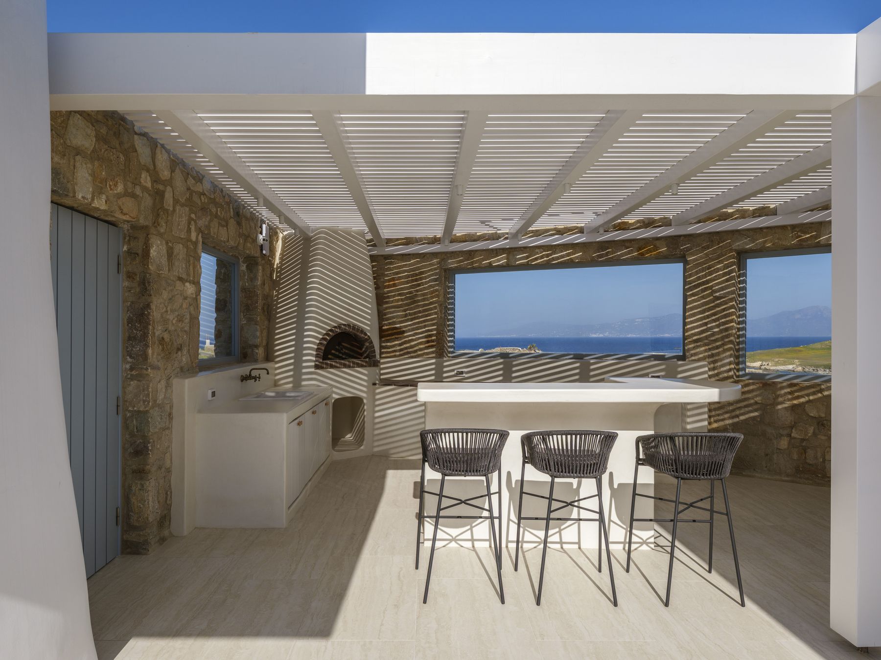 BBQ, wood-fired pizza oven and bar counter