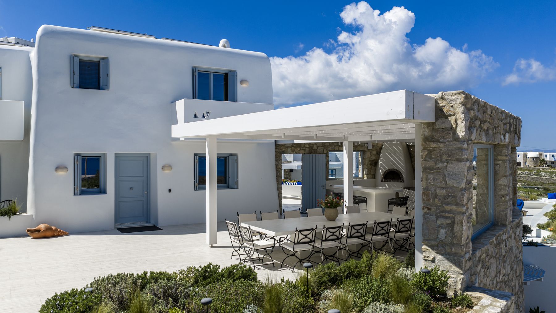 The house and the pergola dining area